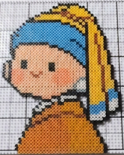 Mini fuse bead portrait design on a pegboard grid